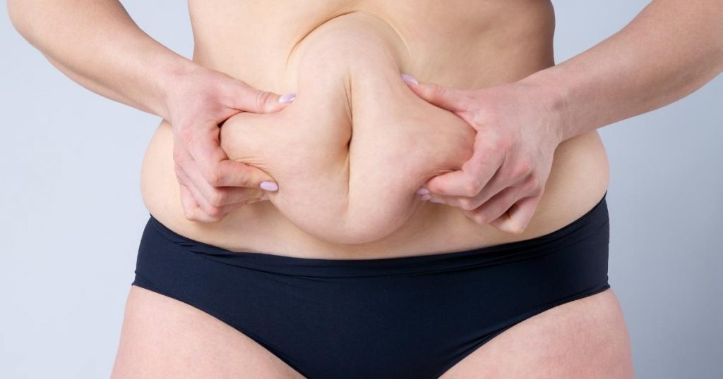 How often should I massage my tummy tuck scar and with what? 